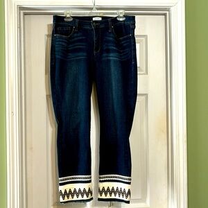 Crown & Ivy jeans size 12 with decorative ankle detail.